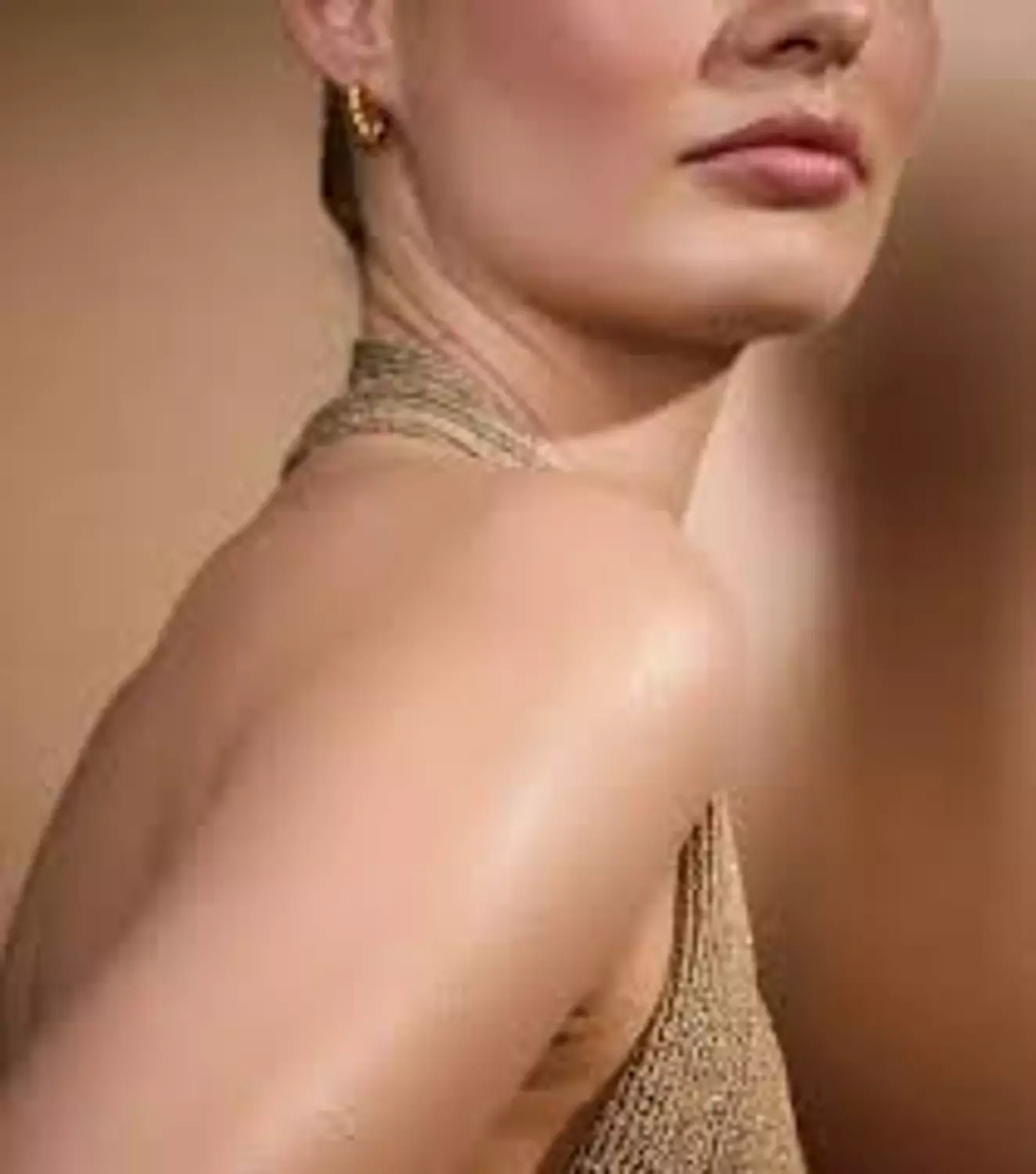 Catrice - *Wonder Woman* - Shimmer Body Oil - 020: Sassy hover image