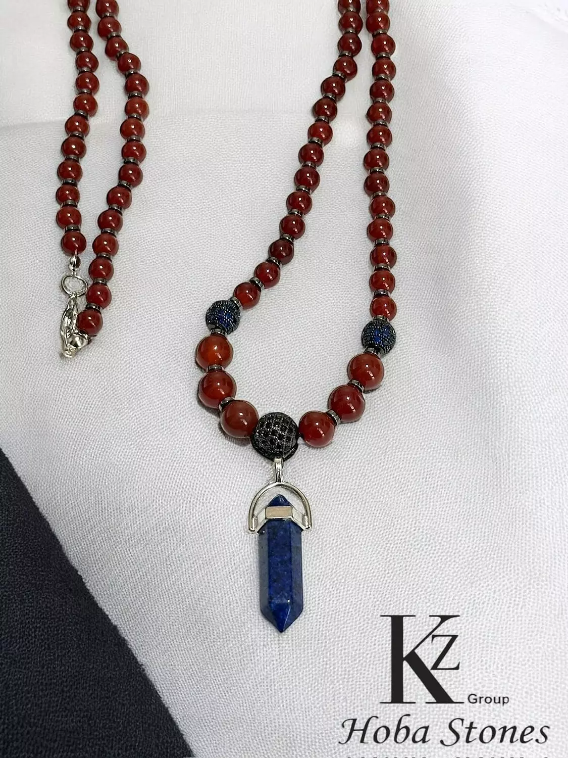 Red agate necklace with hematite separators and Lapis lazuli pendant image