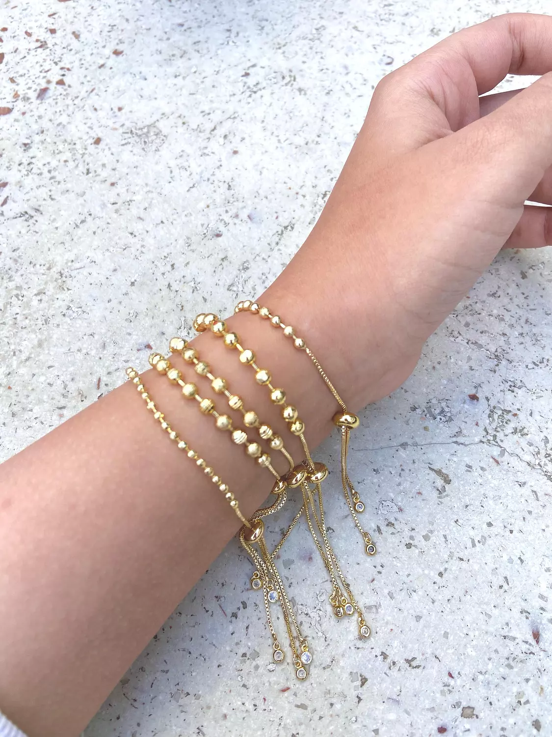 Gold circle bracelets 1