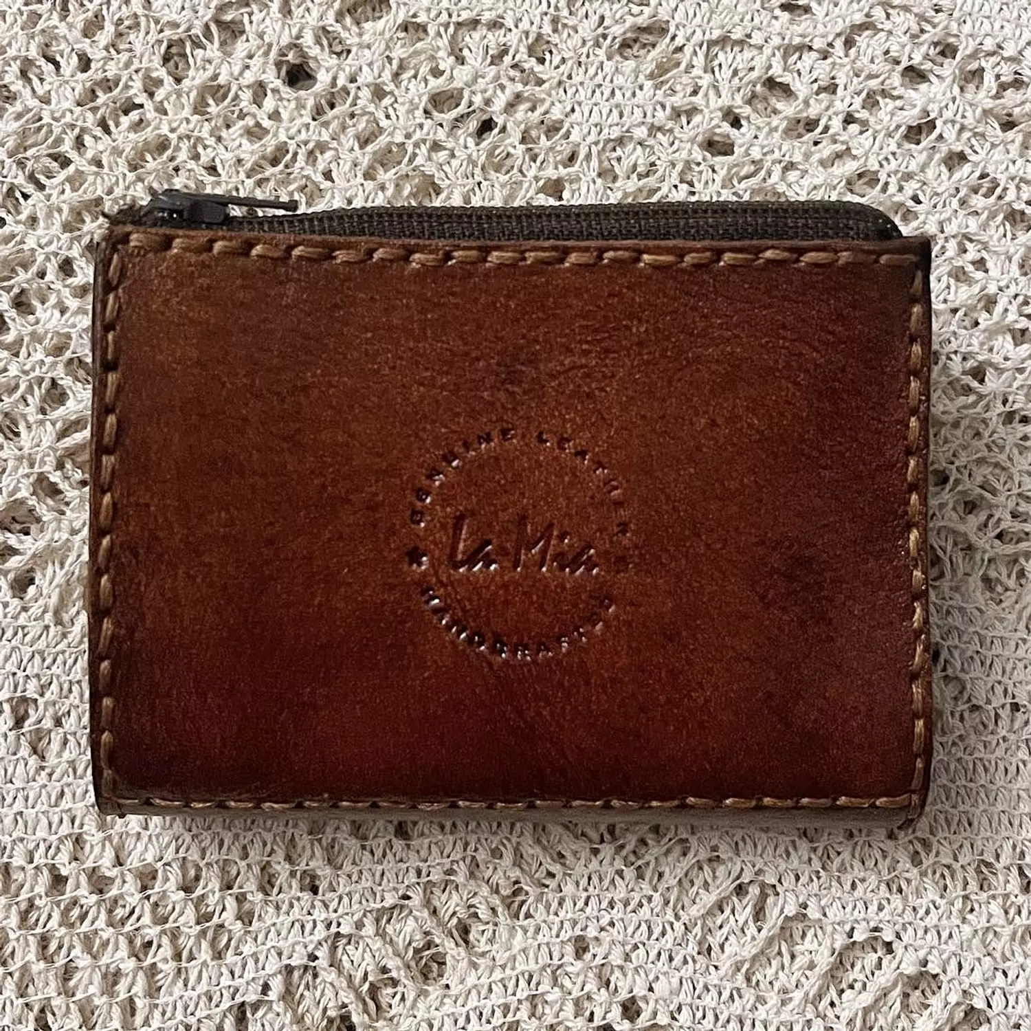 Tooled floral vines small leather wallet hover image