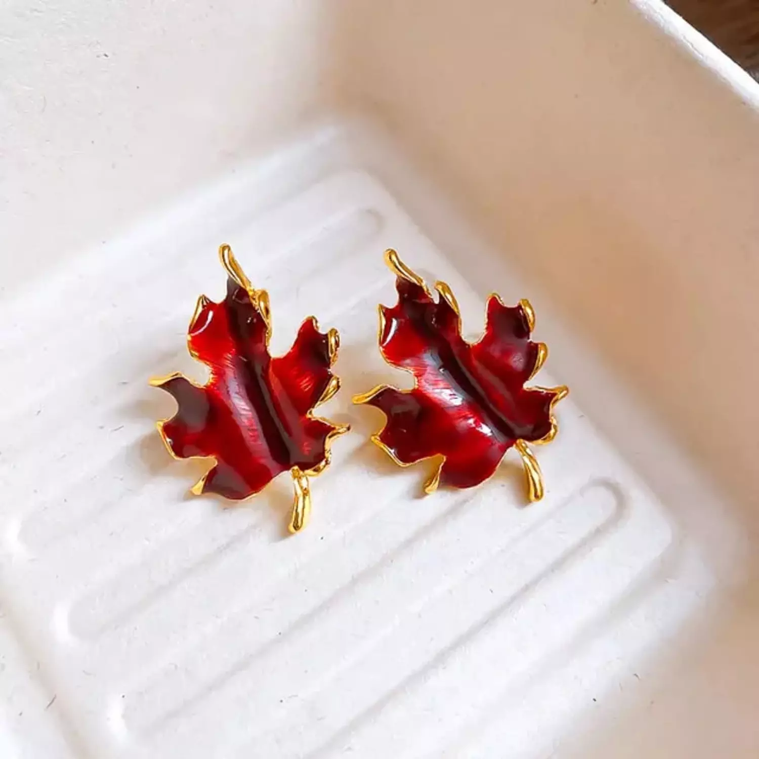 crimson maple leaf earrings 🍁 hover image