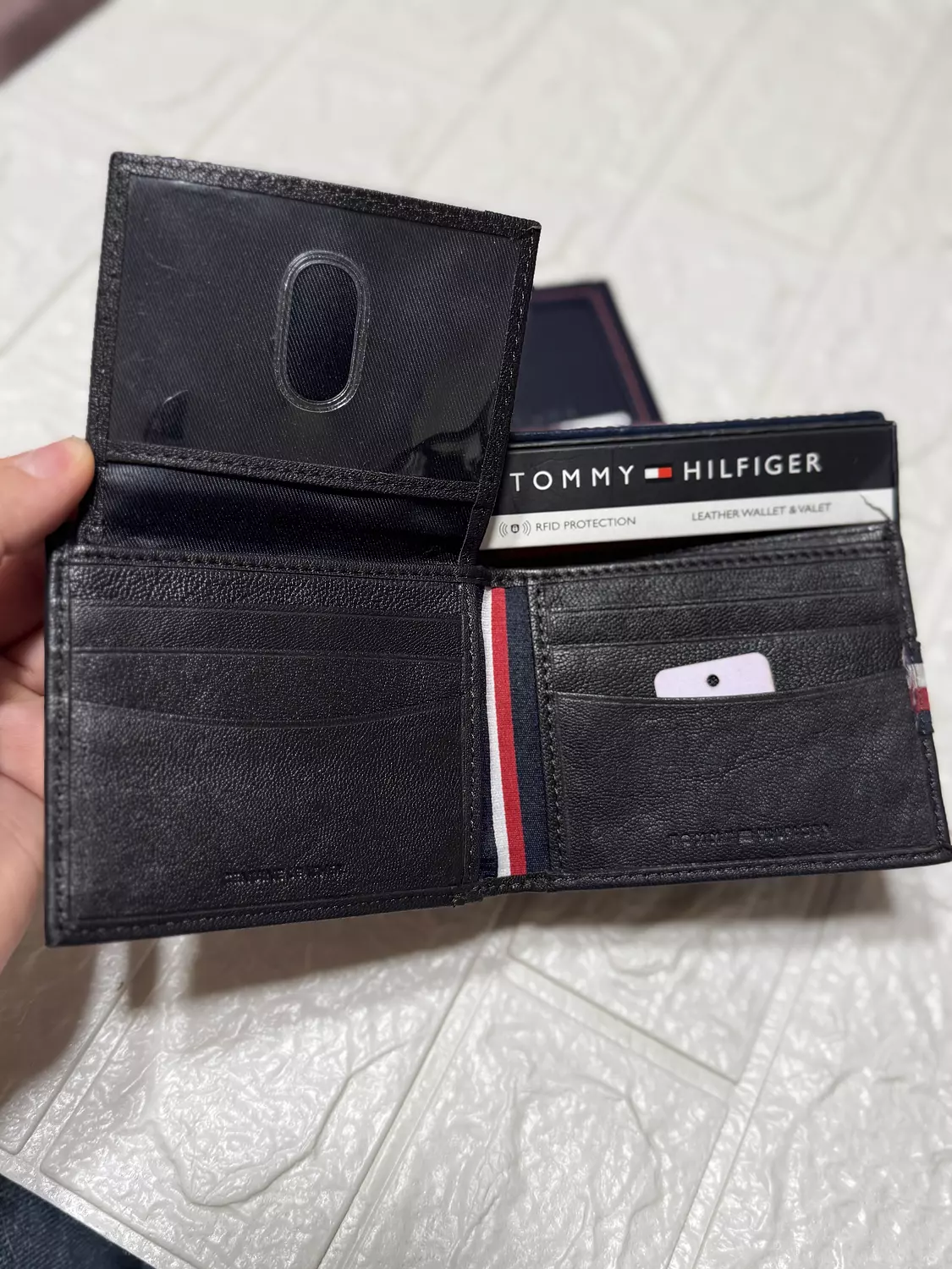 Tommy Hilfiger Men’s Leather Wallet with Fabric Stripe – RFID Protected hover image