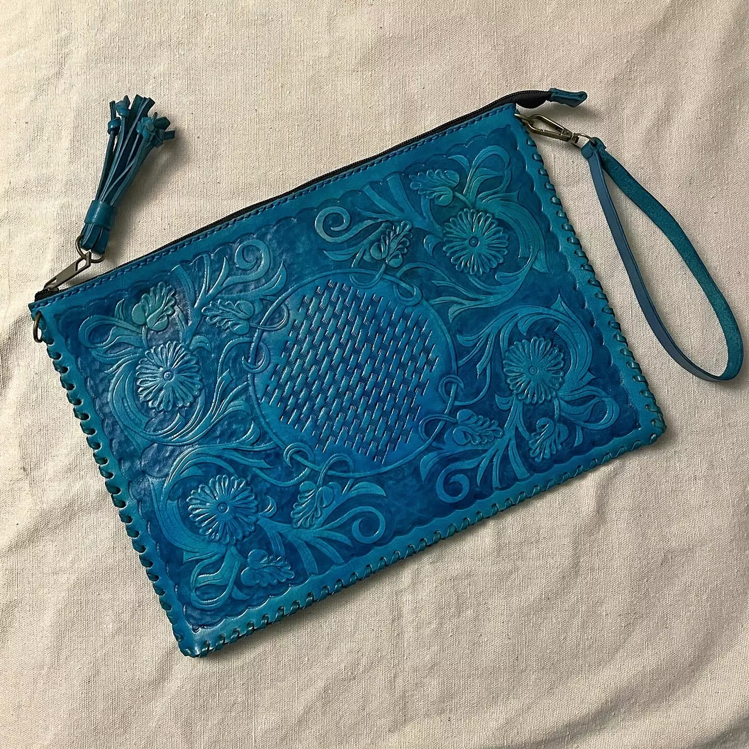 Floral basket tooled leather clutch 5