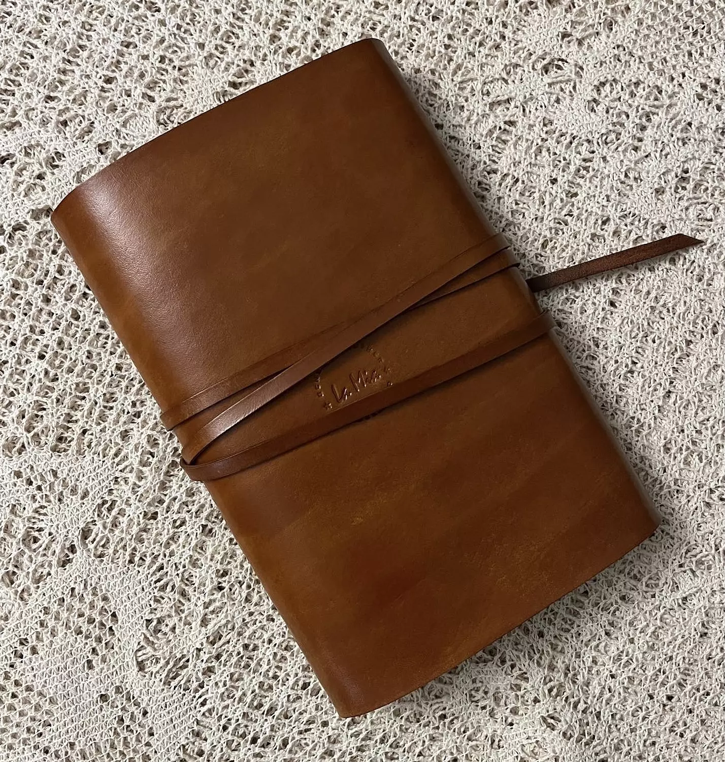 Tooled painted blossom vines leather cover with wraparound tie strap 3