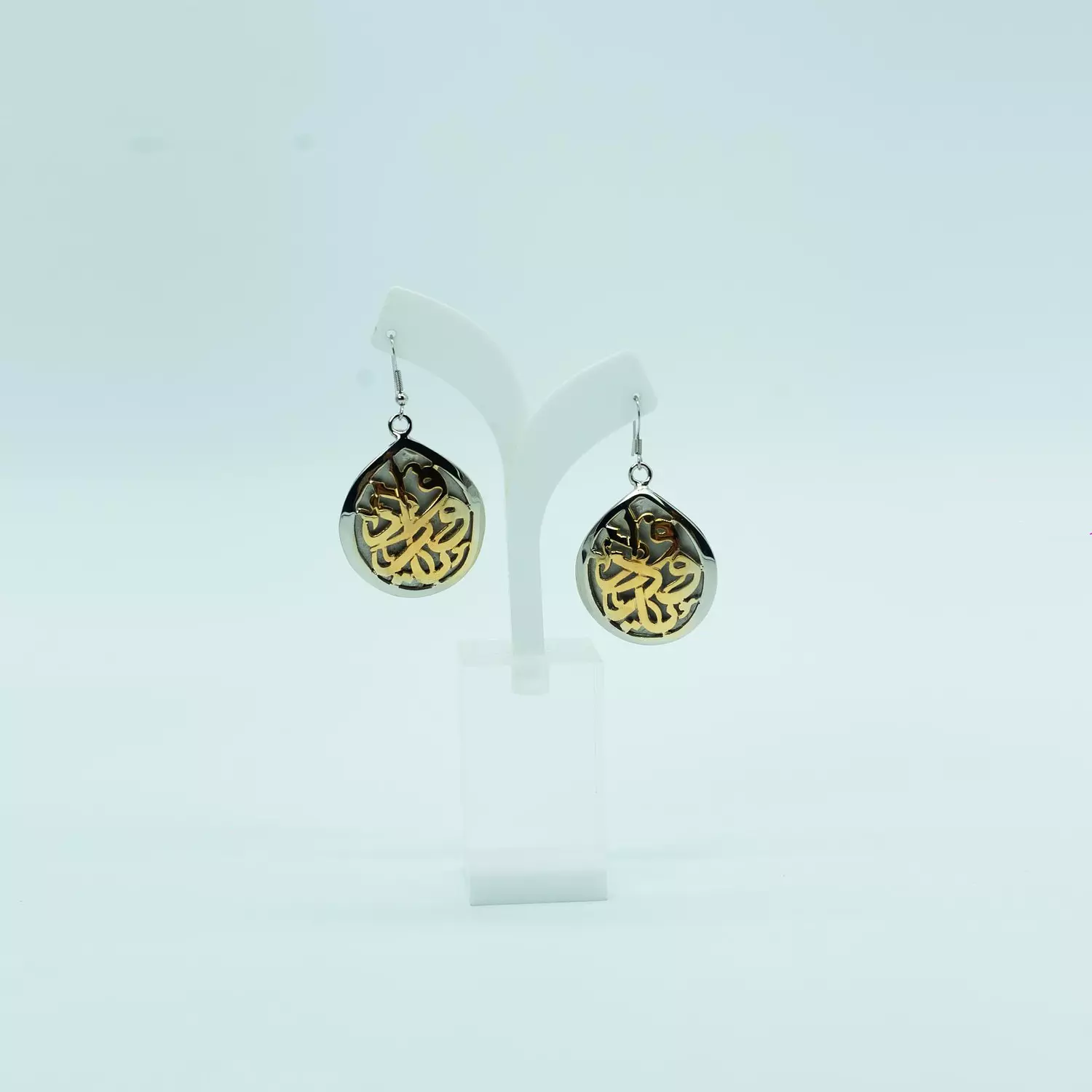Two-layer copper hoop earrings, curved, sculpted, and plated with matte and shiny gold, silver, and platinum, with a mother-of-pearl stone. 3