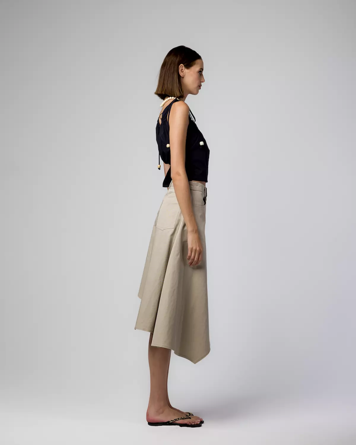 BEIGE GABARDINE ASYMMETRIC SKIRT hover image