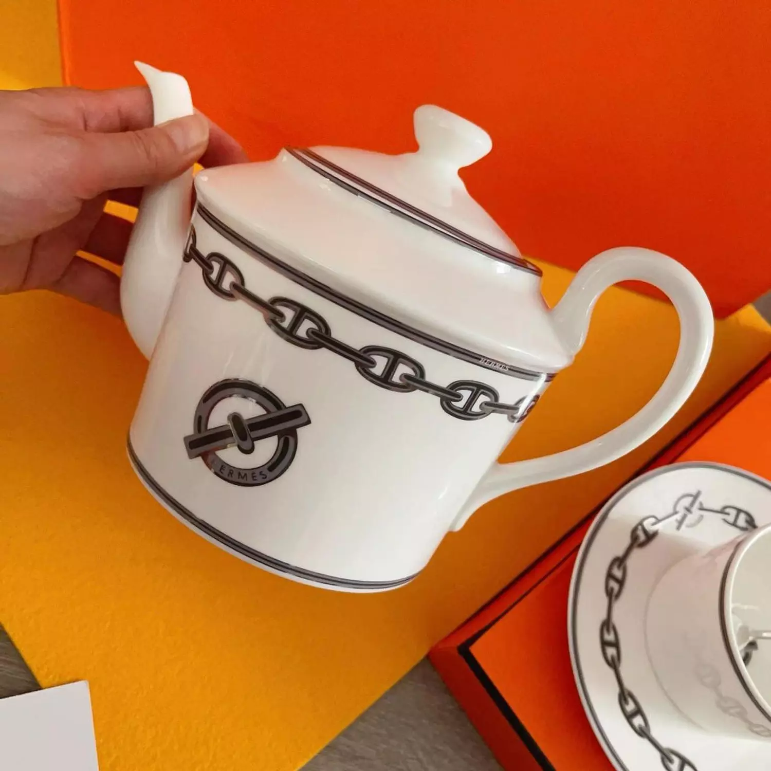 luxurious Hermès Chaine d'Ancre porcelain tea set in platinum silver, featuring iconic anchor chain motifs 2