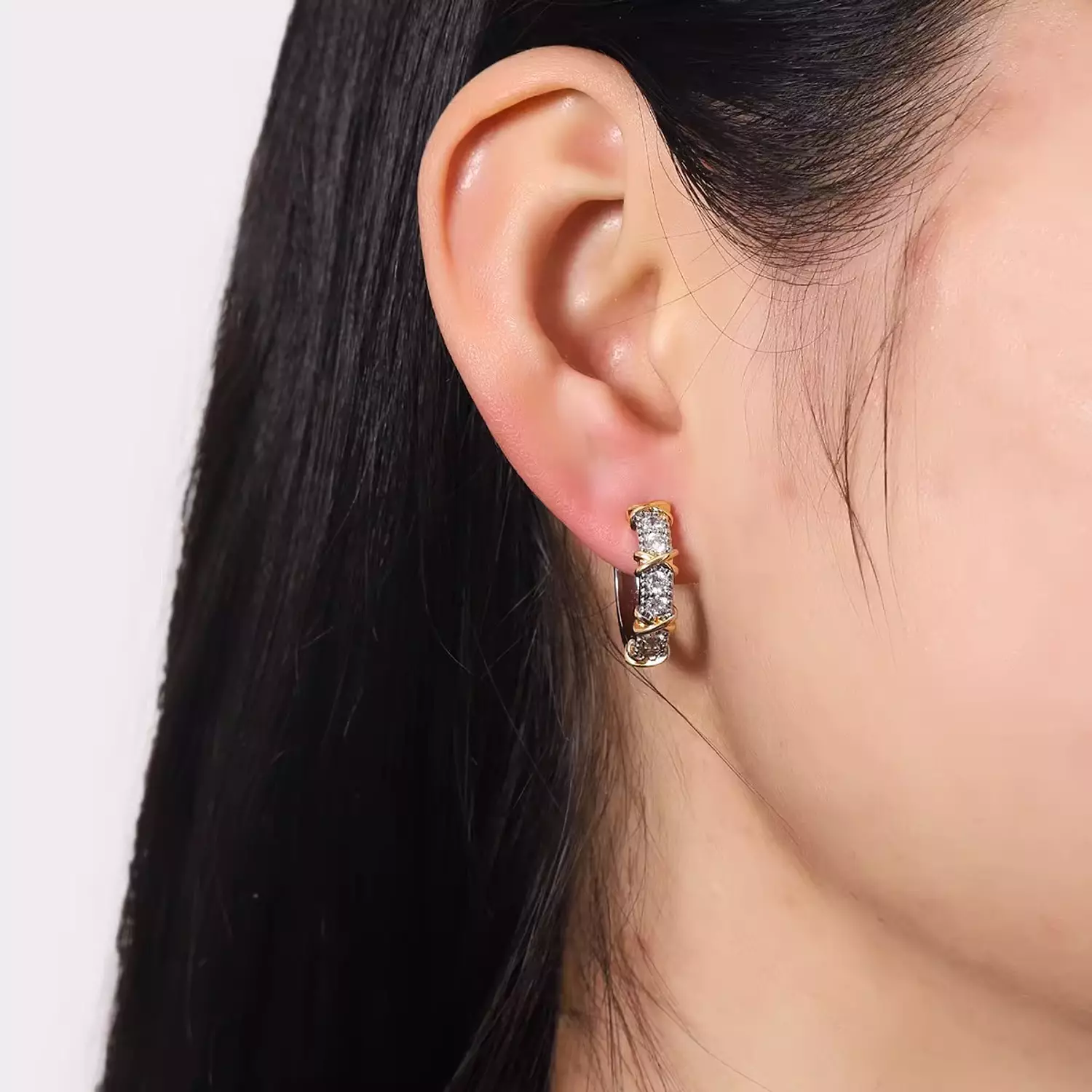 XO double tone zircon earrings hover image