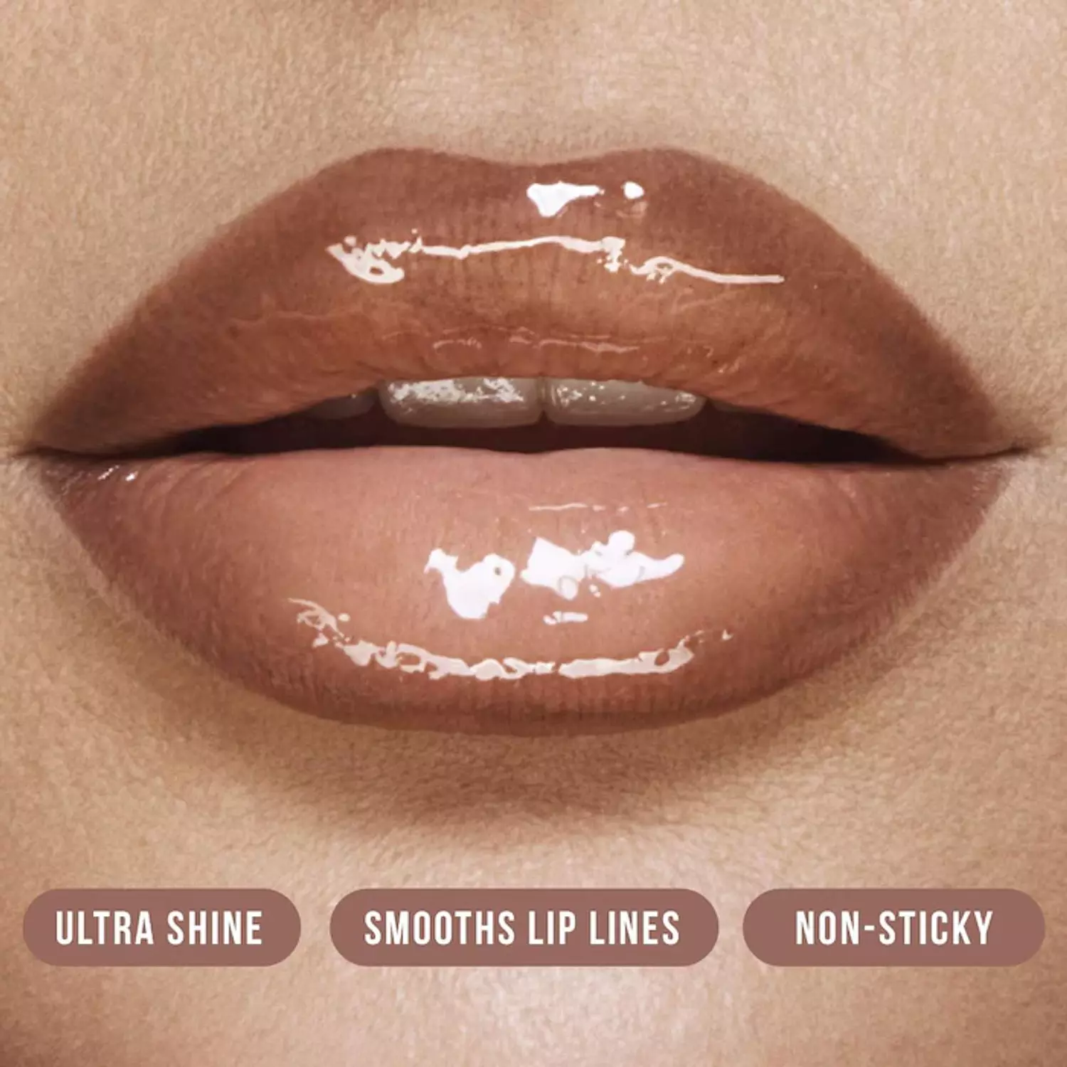 HUDA BEAUTY Faux Filler Shiny Non-Sticky Lip Gloss 1