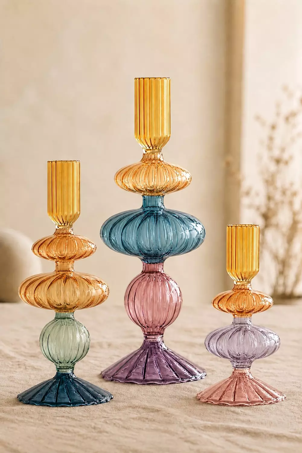 A Set of three candle holders 3