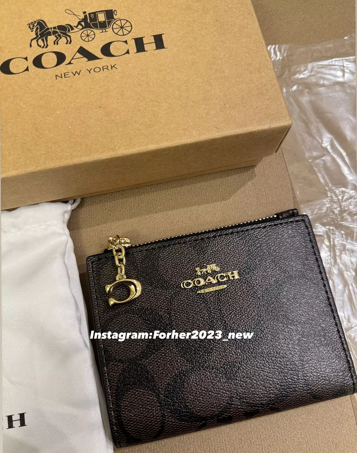 Coach bifold wallet brown black image