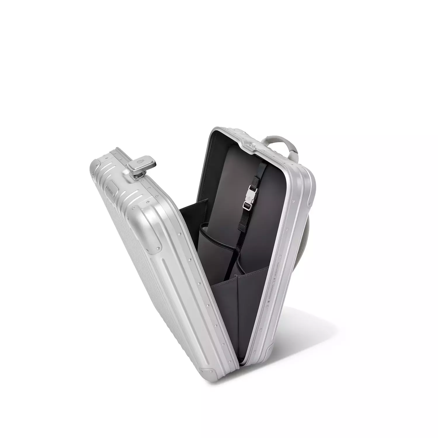 Rimowa Original Backpack is a sleek, silver hard-shell backpack 6