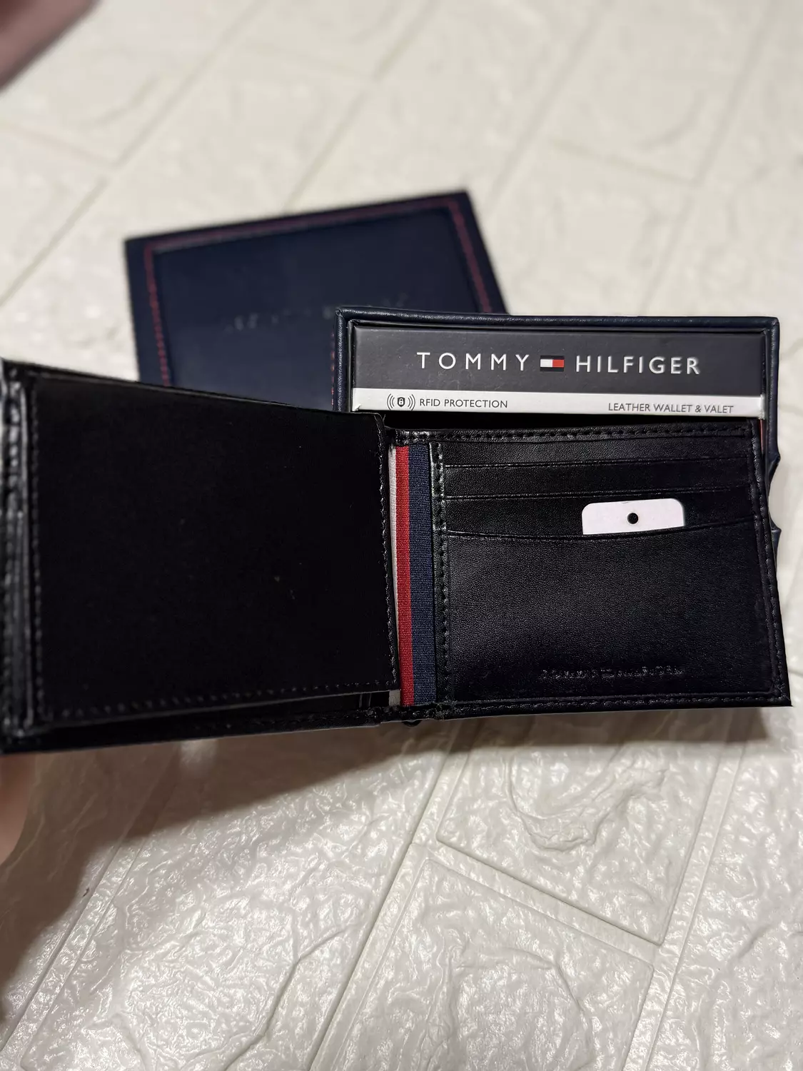 Tommy Hilfiger Men’s Black Leather Wallet – RFID Protected hover image