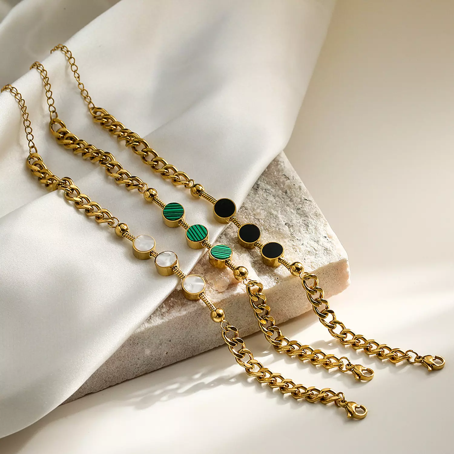Triple round charms bracelet image