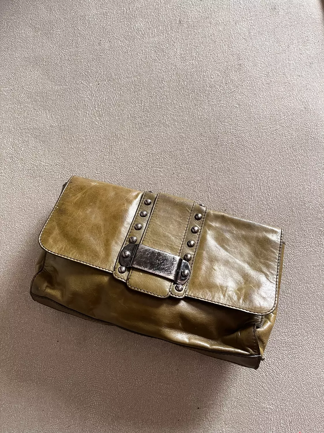 The perfect olive clutch  hover image