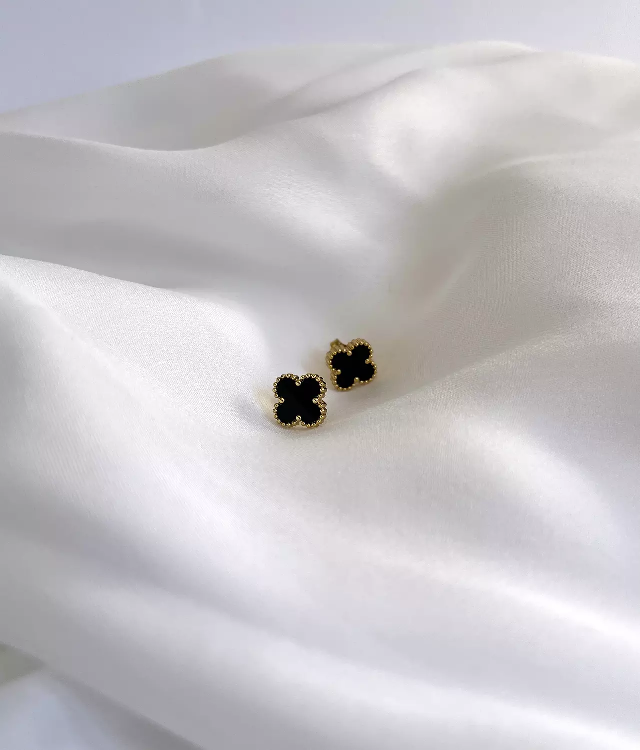Black van cleef studs image