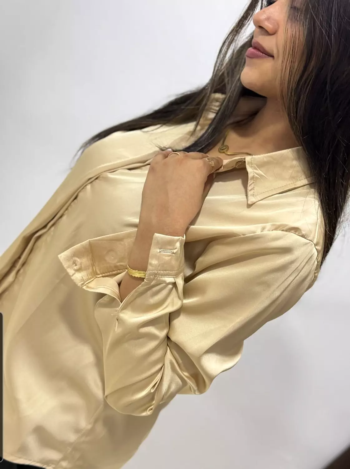 <p style="text-align: start"><span style="color: rgb(0, 0, 0)"><strong>Fashion Satin Shirt- Gold</strong></span></p>