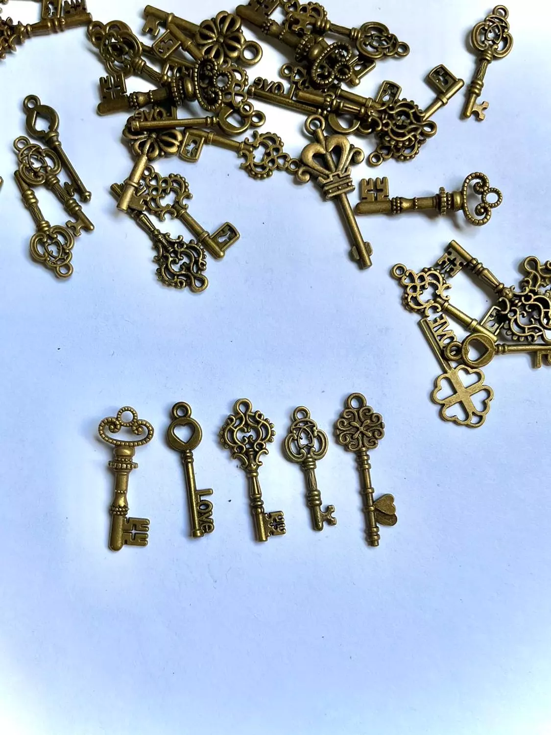 small vintage key charm image