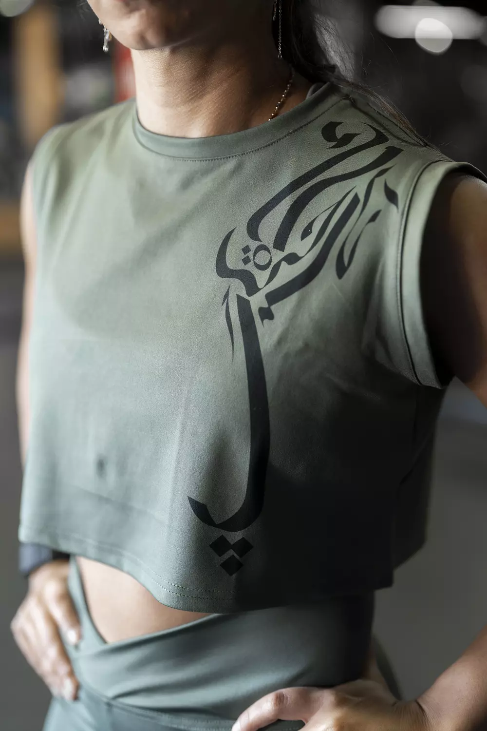 HURRA'S OLIVE SPORTY TOP - حره كالسحاب image