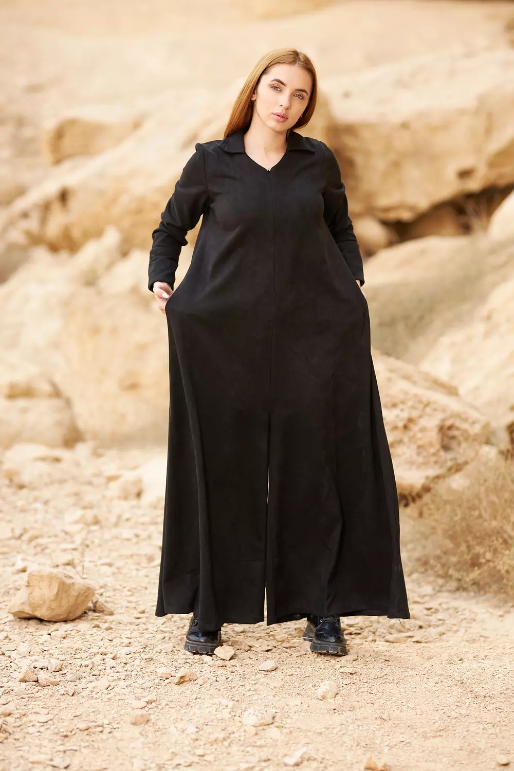 Black winter jumpsuit made of suede hover image