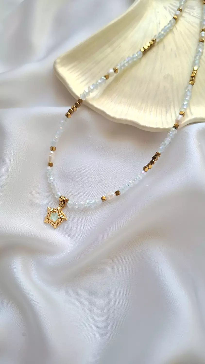 Golden star & white necklace  image