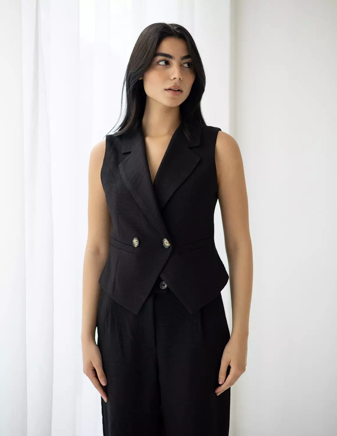 <p>Double Breasted Linen Vests</p>