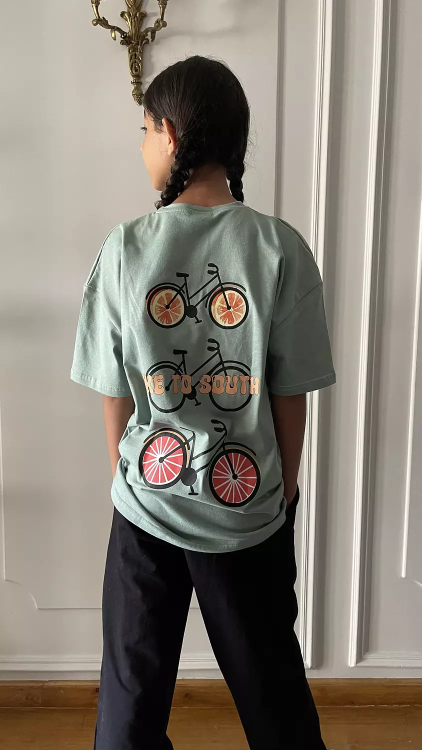 SOUTH Unisex Pastel Green Bike to South oversized t-shirt image