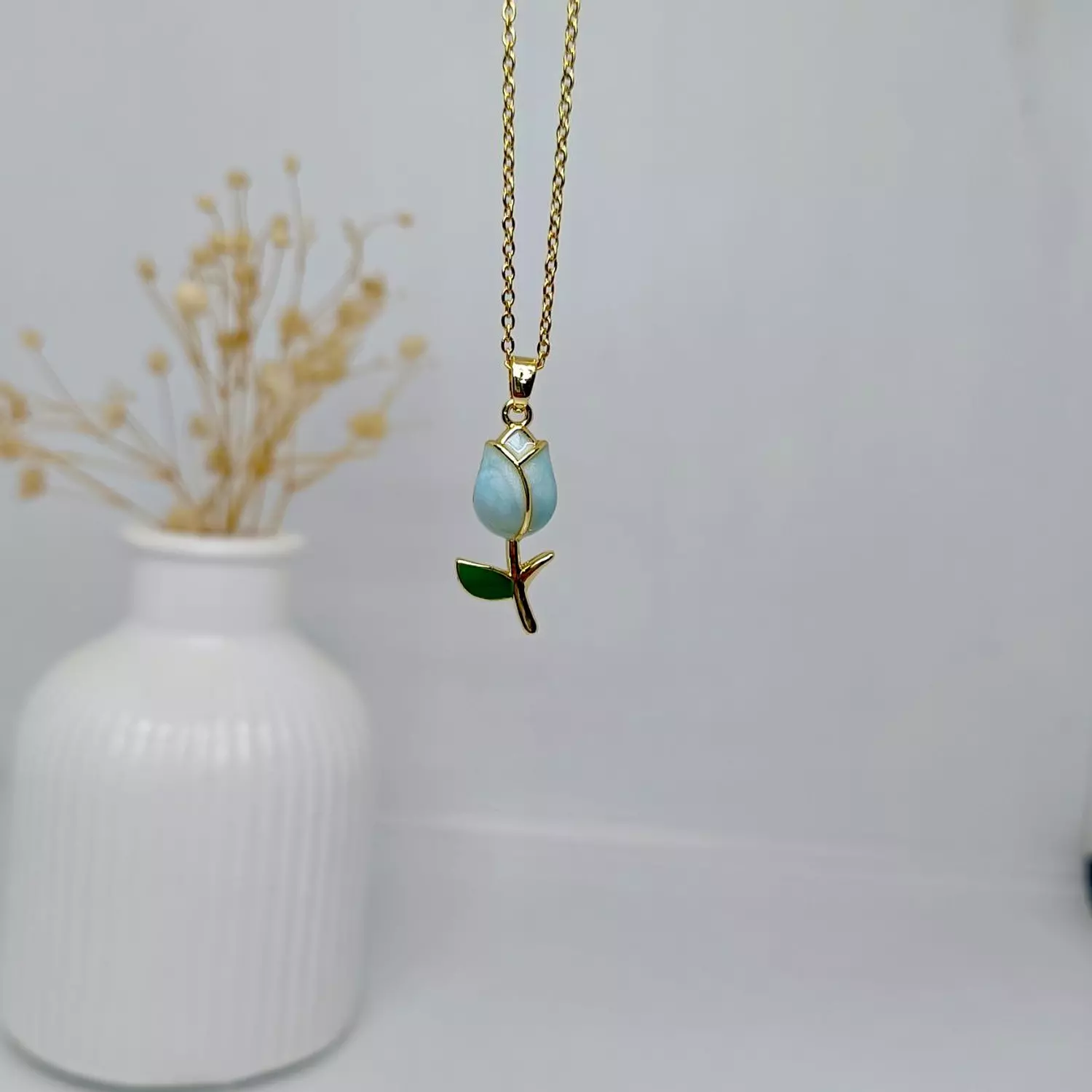 baby blue flower necklace image