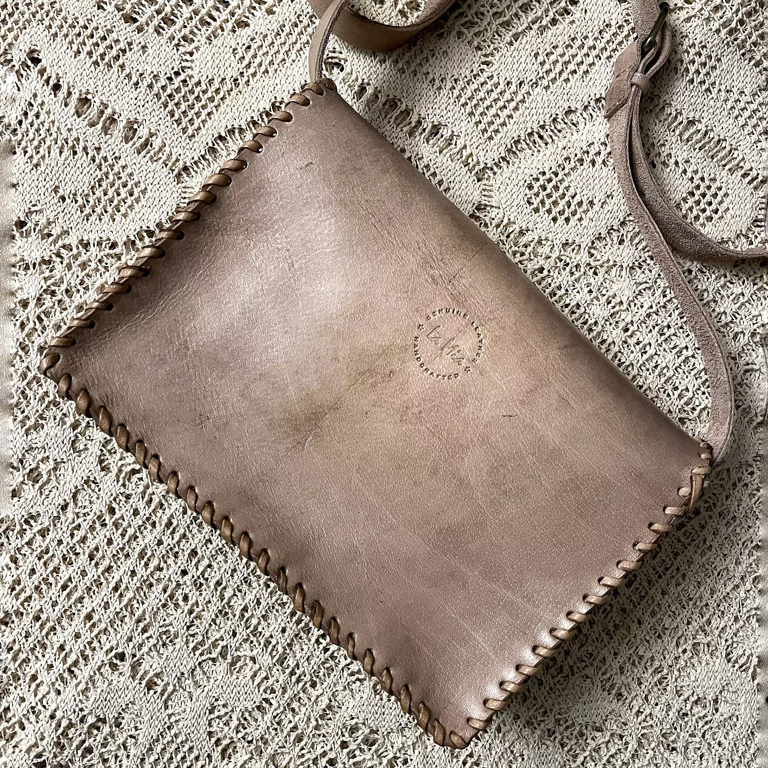 Tooled floral rectangular flap leather bag 15