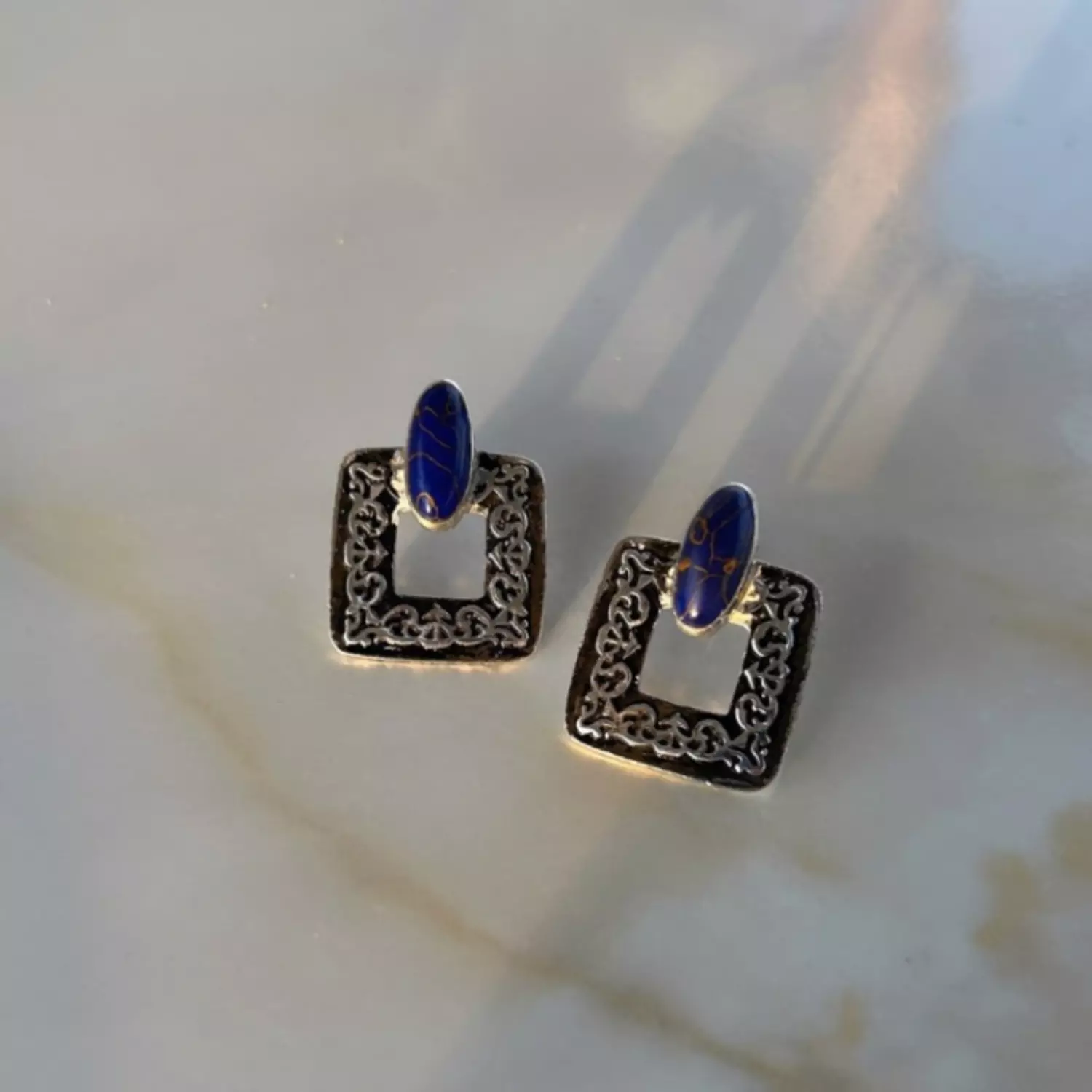 Squared blue stone earring image