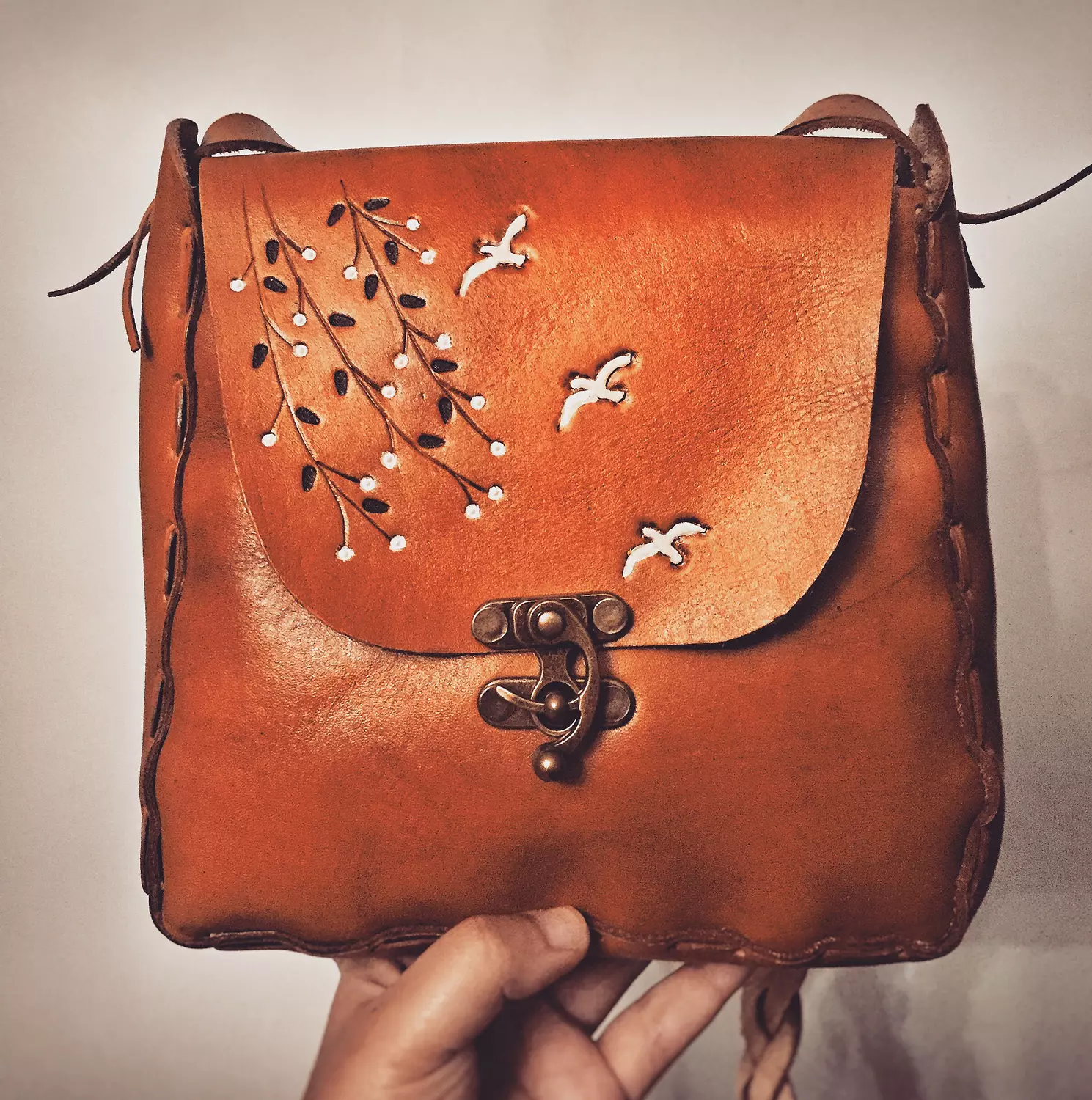 Birds & branches tooled leather bag image