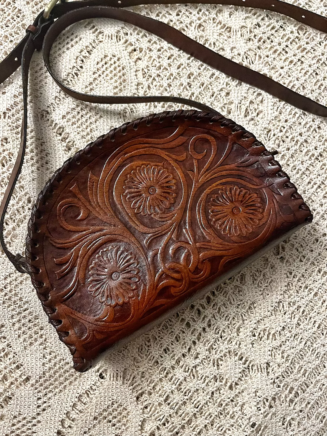 Floral Taco tooled leather bag zipped image