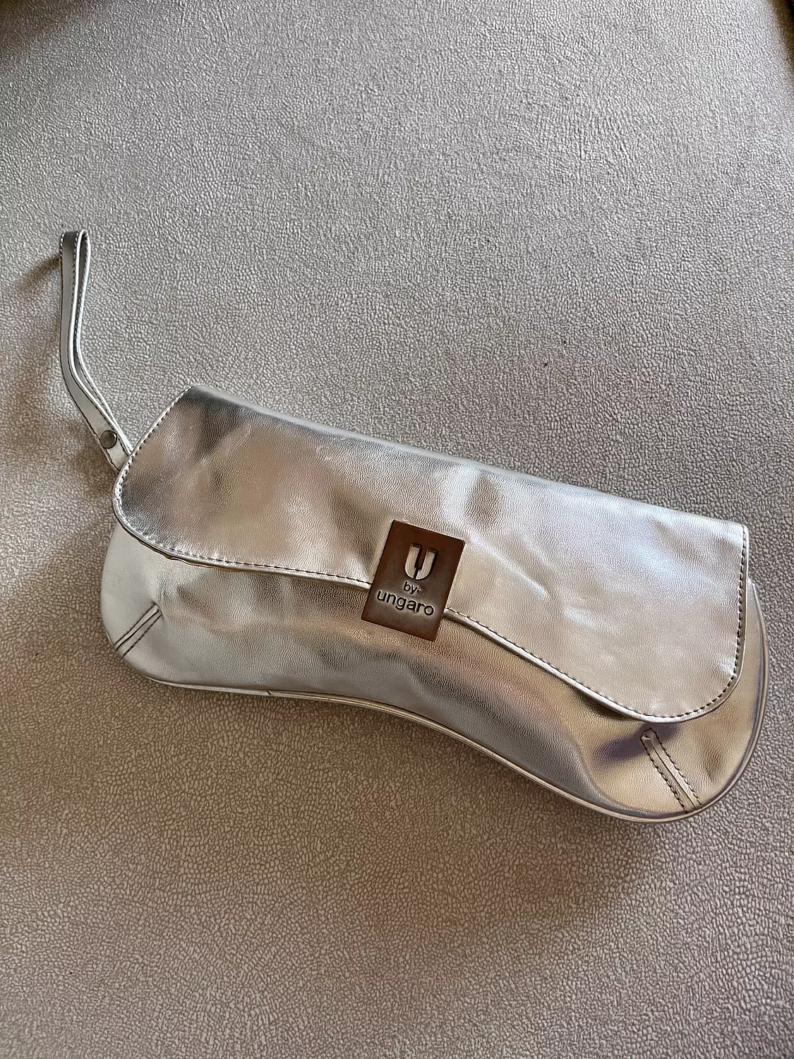 Metallic silver clutch