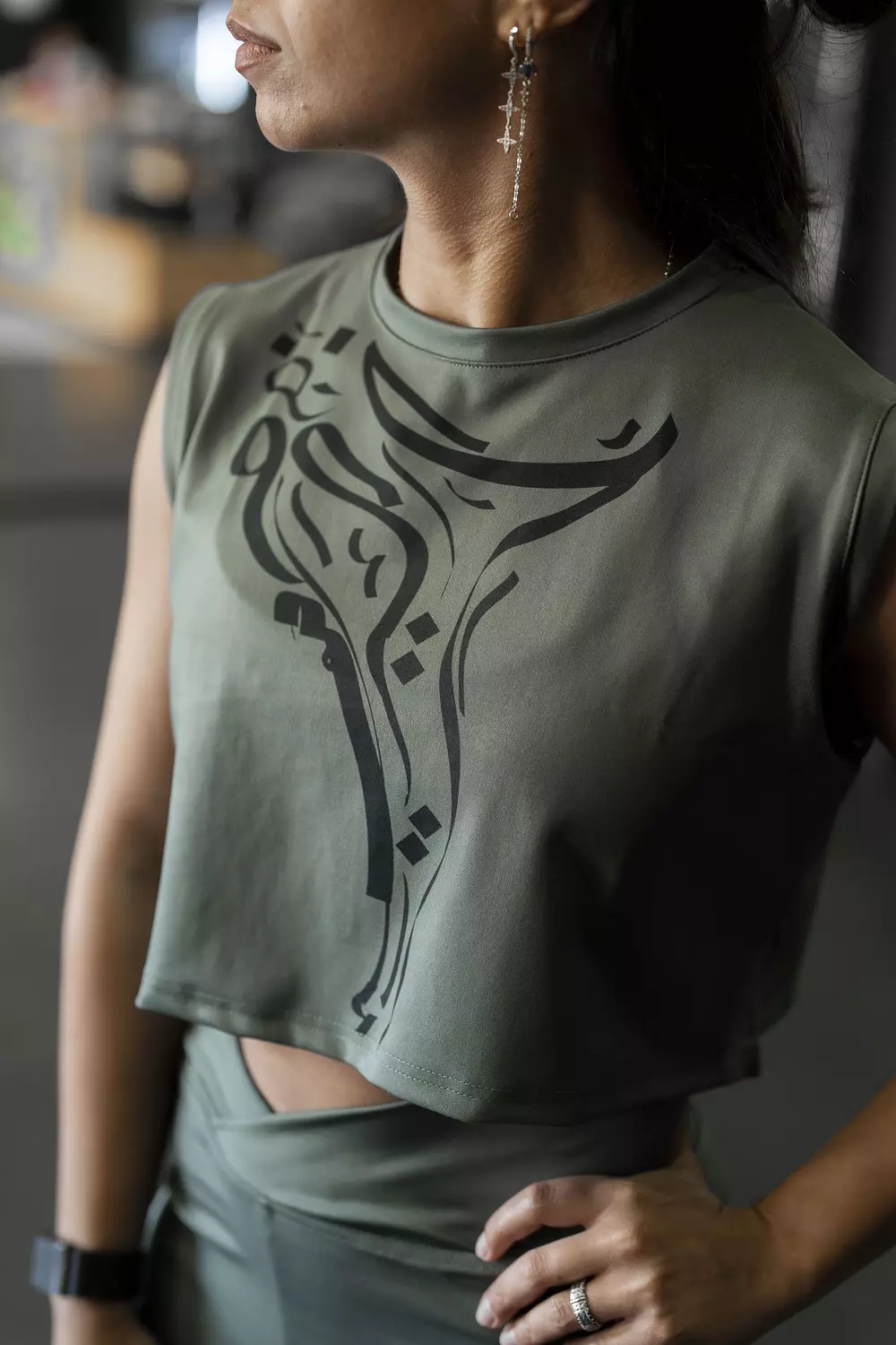 HURRA'S OLIVE SPORTY TOP - انتي و كفى  3