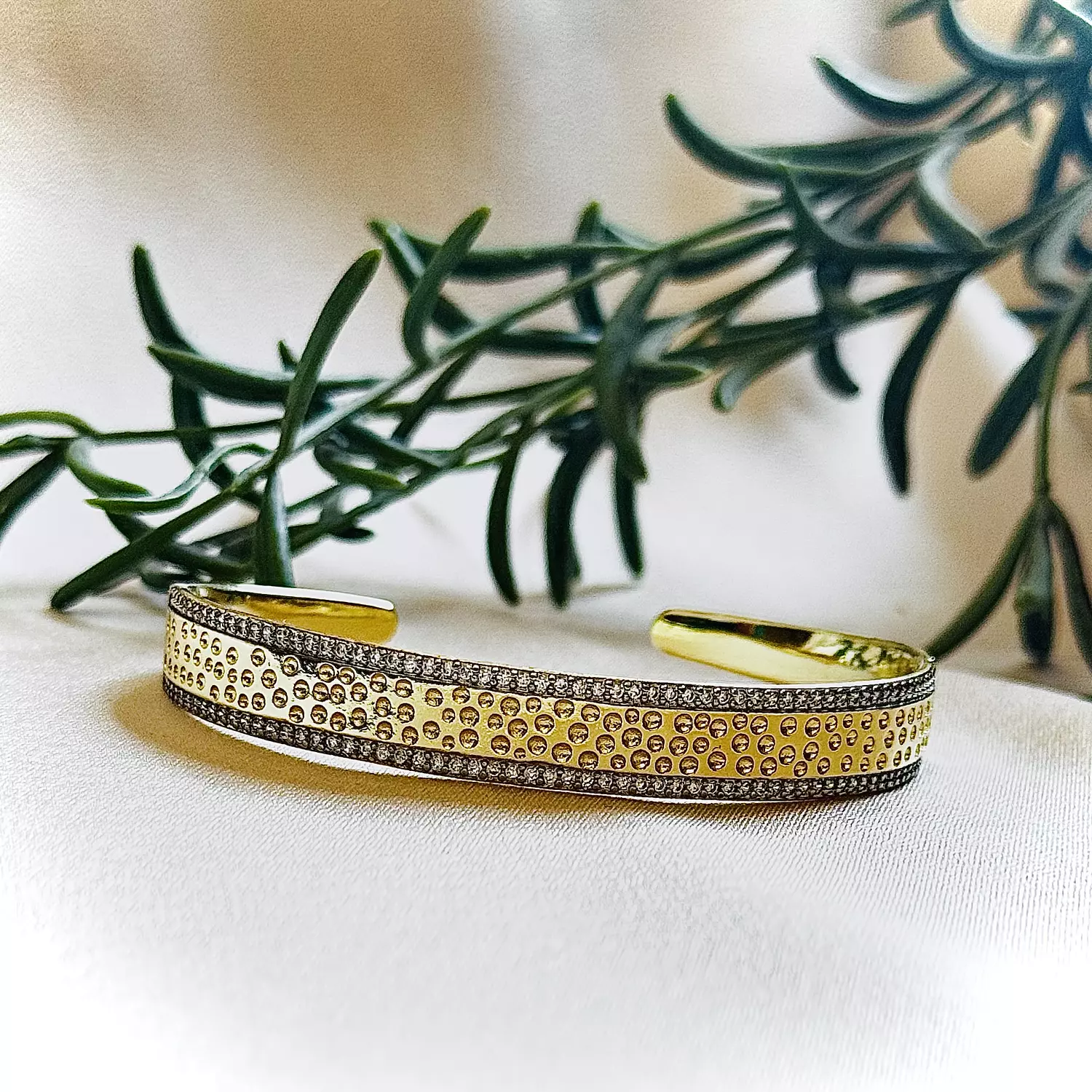Double zircon lines open bangle image