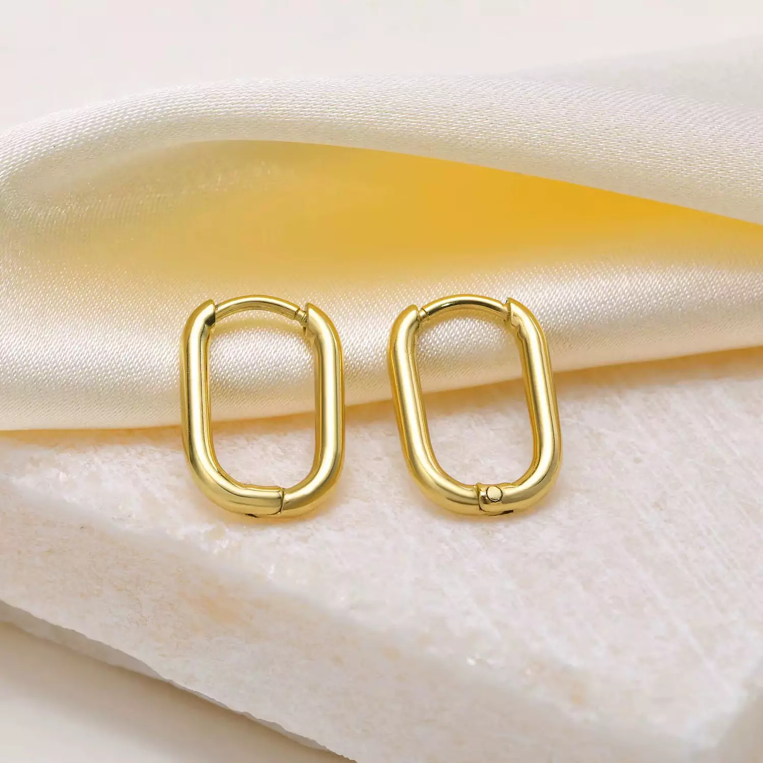 Huggie hoop earrings hover image