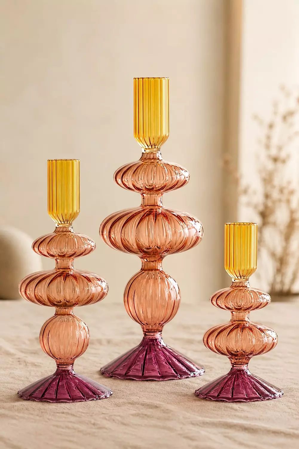 A Set of three candle holders hover image