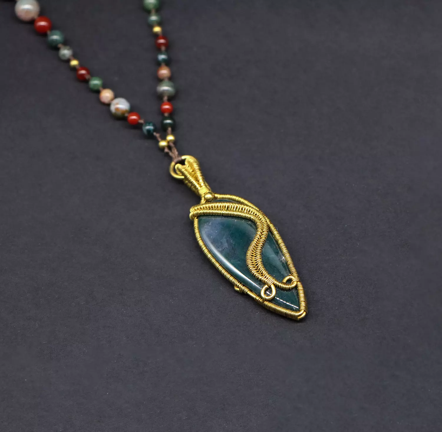 Pendant with moss agate gemstones. image