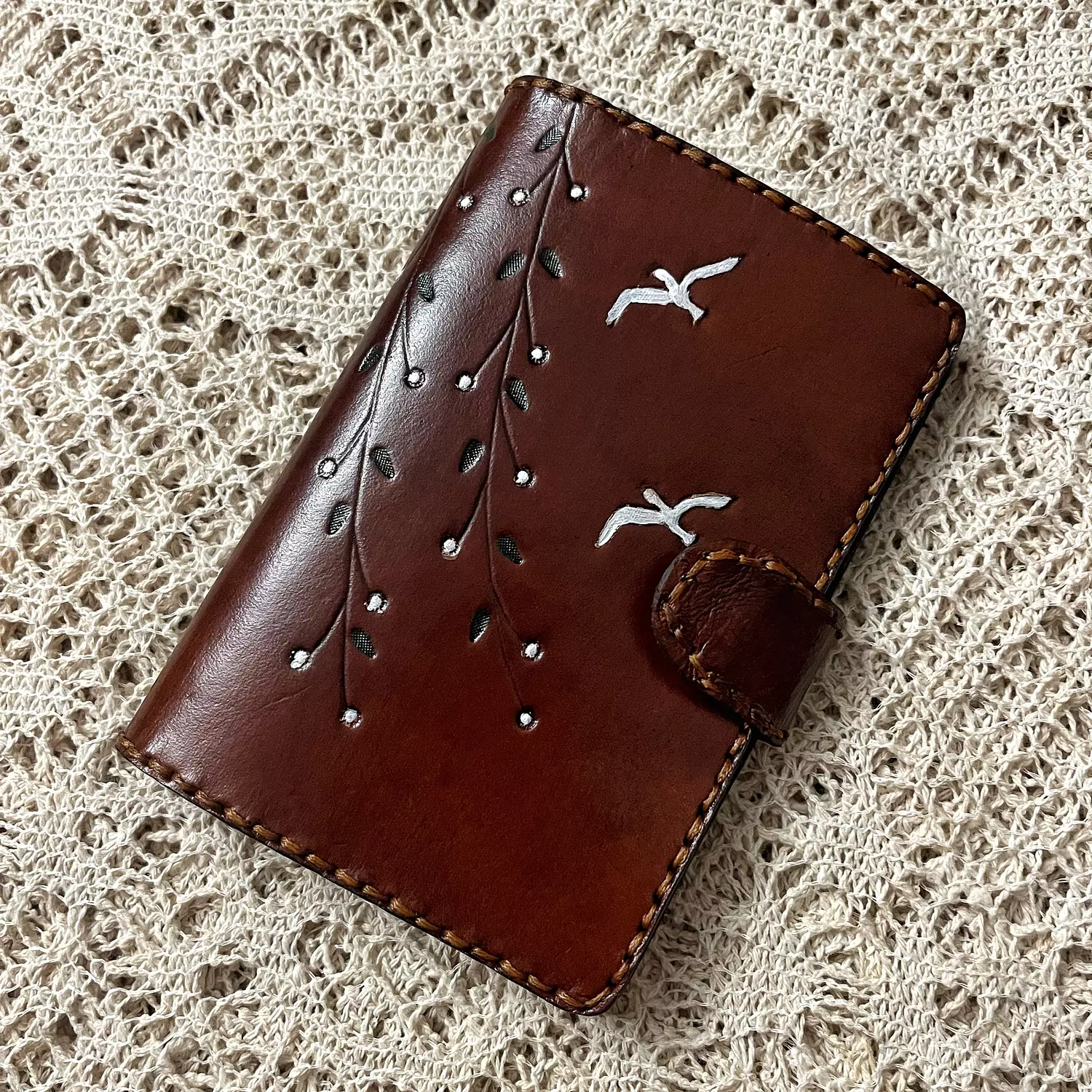 Birds & branches tooled leather passport holder  image