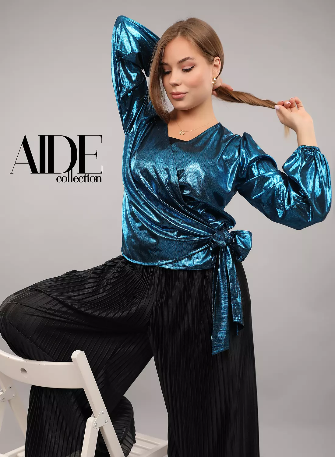 Cross metalic blouse  hover image