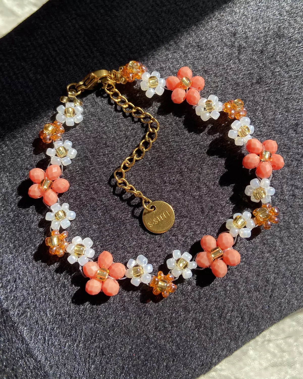 Zig zag crystal flowers coral shades and white 🤍 image