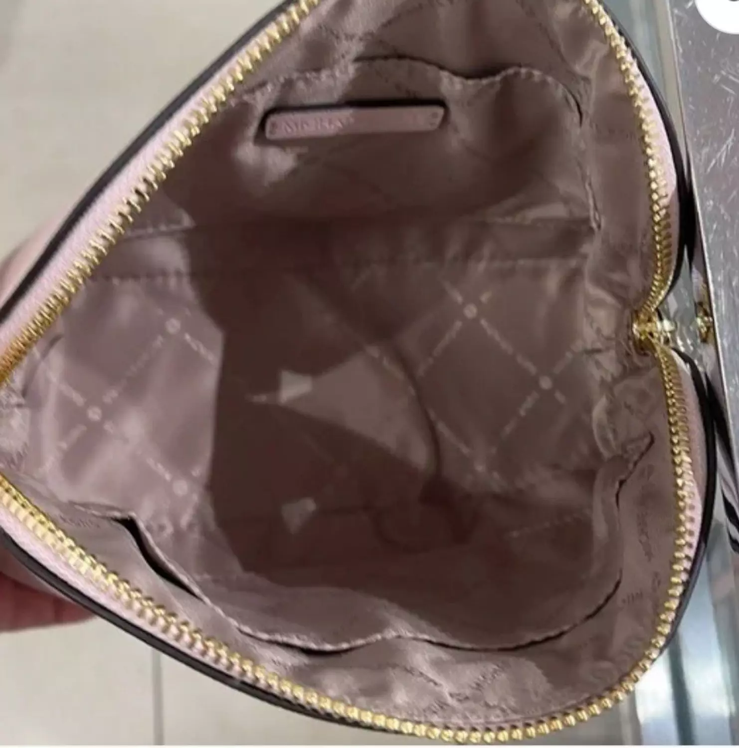Michael kors dome or half-moon shaped crossbody bag  hover image