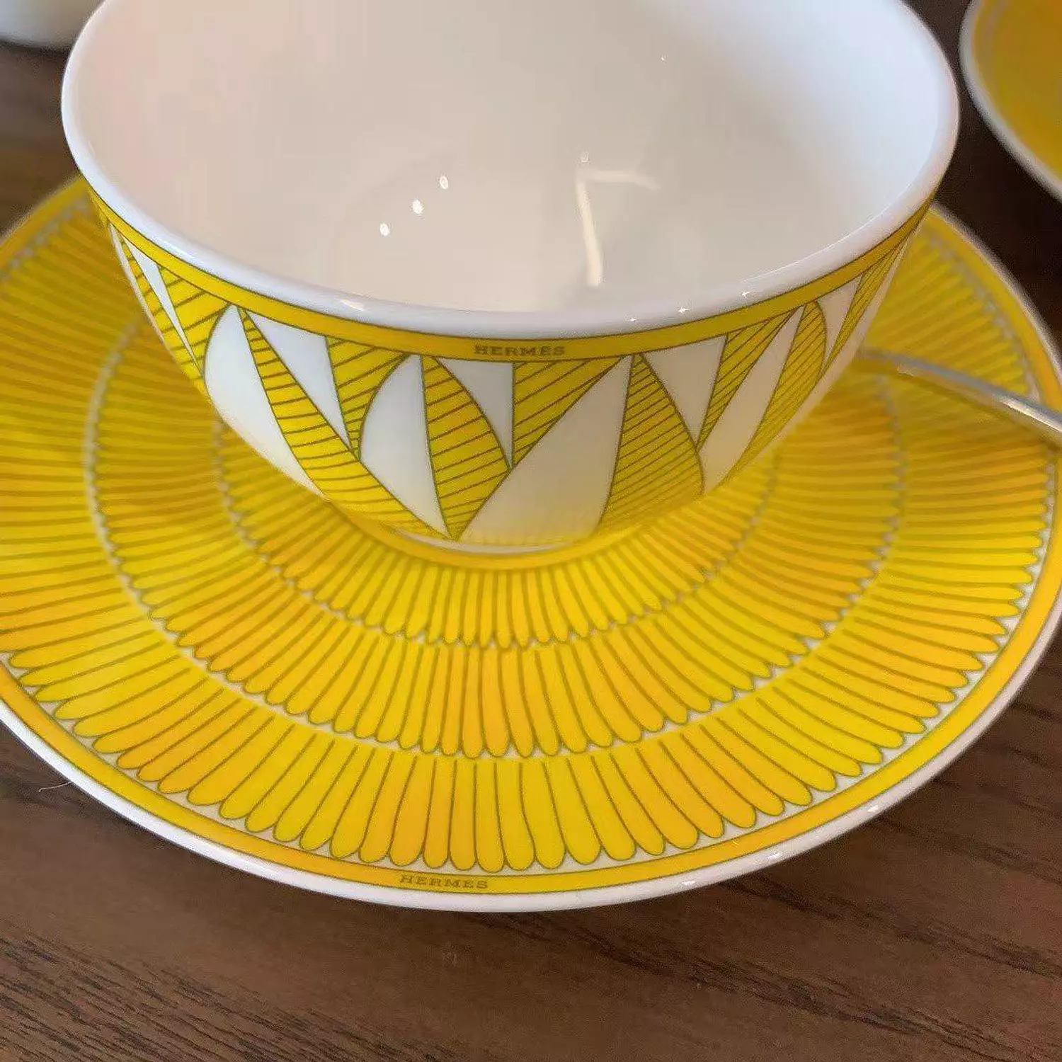 Hermès Soleil d'Hermès porcelain tea set in a bright yellow and white pattern 3