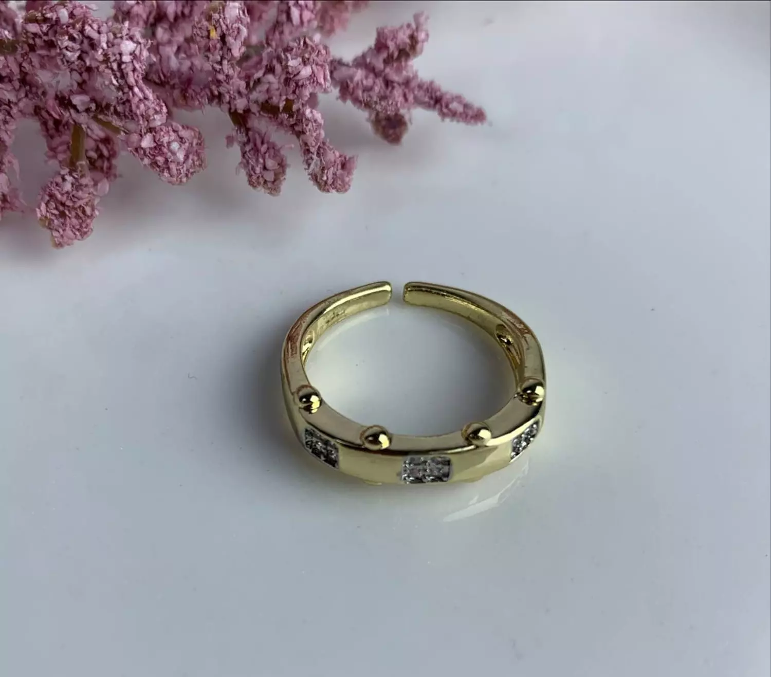 Gold pleated Ring with zircon diamonds hover image