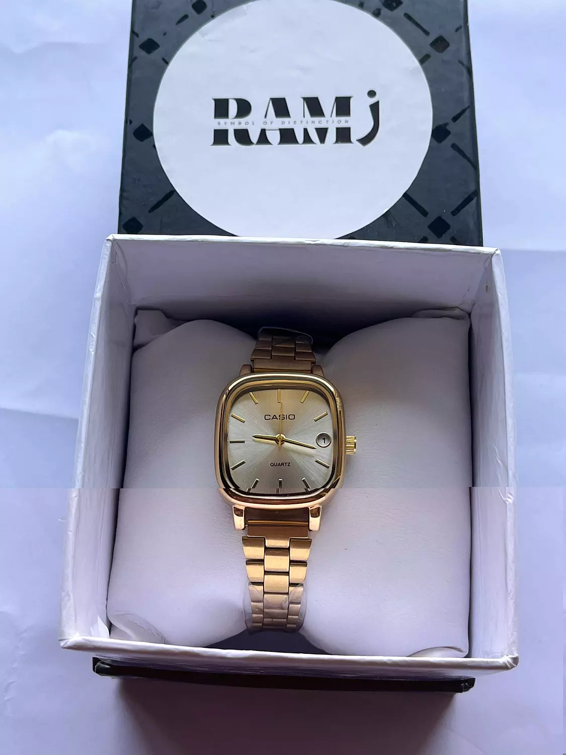 Female old money casio Gold x White image