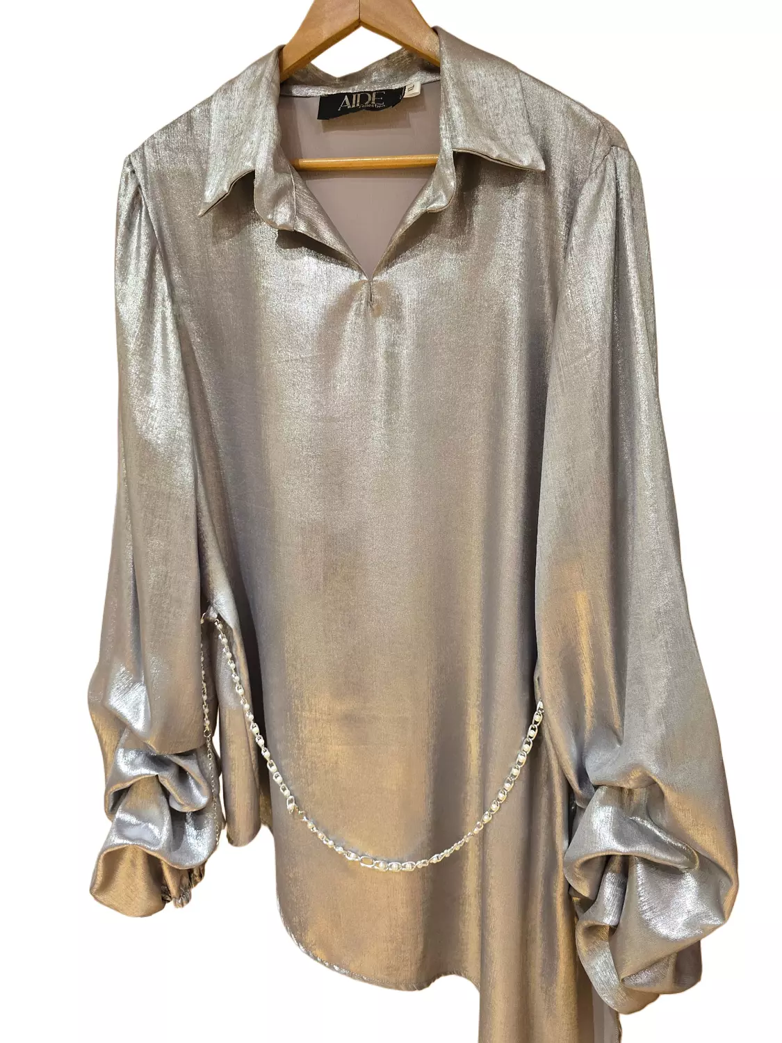 Metallic suit..  hover image
