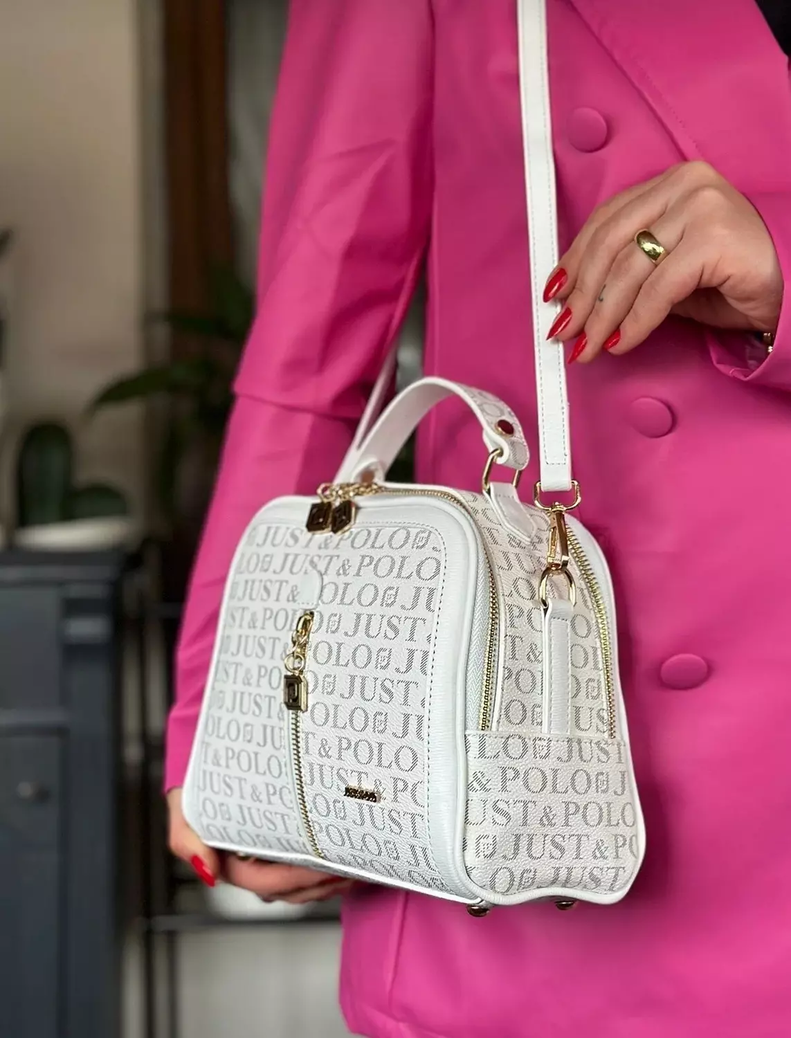 White Monogram Handbag with Gold Accents and Adjustable Strap image