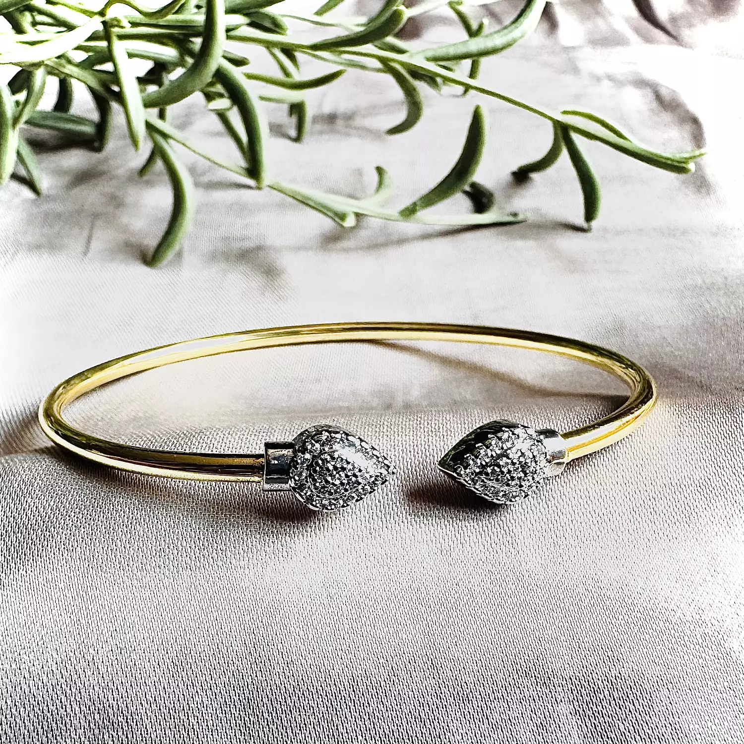 Double zircon shapes open bangle hover image