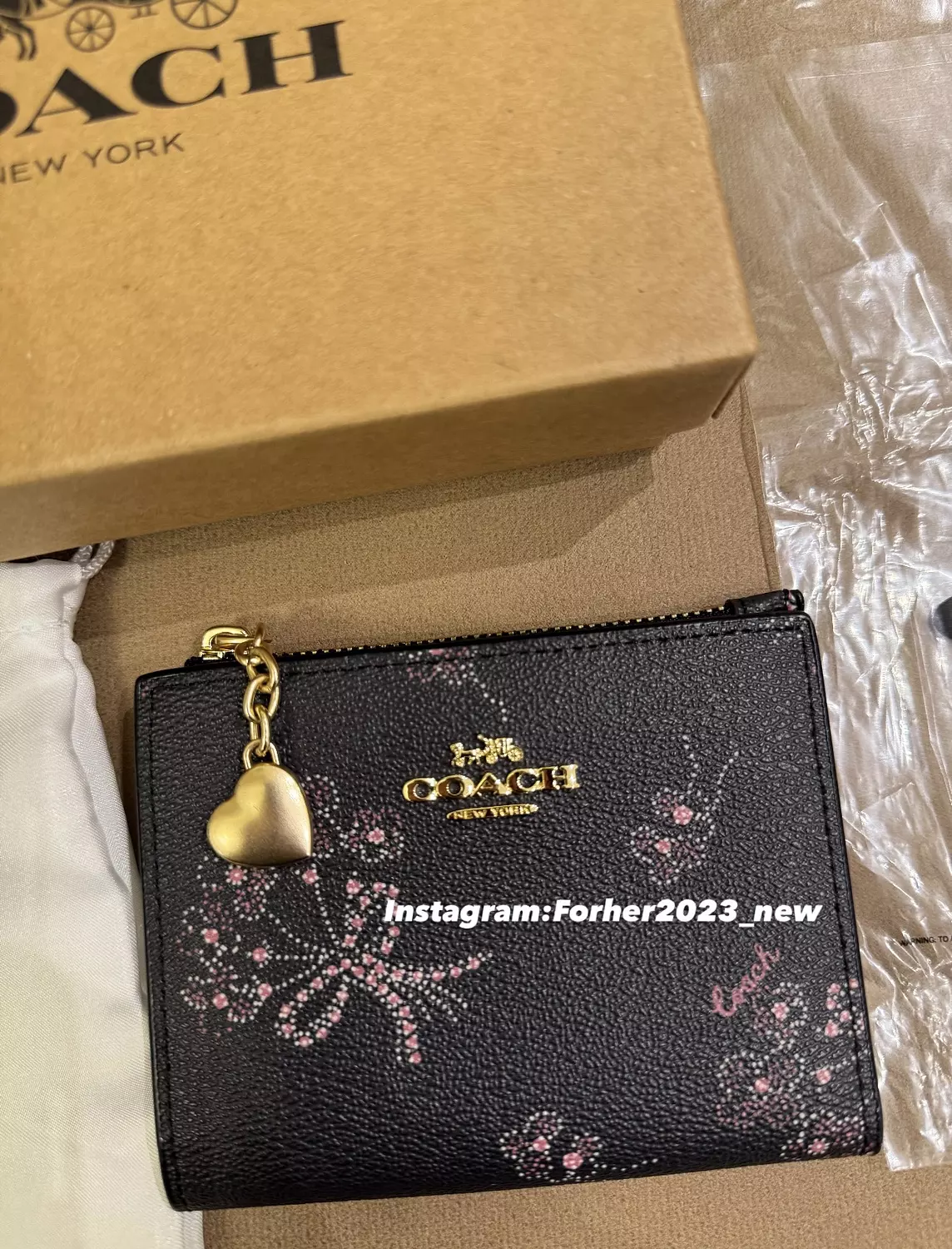 Coach bifold wallet black with purple flowers image
