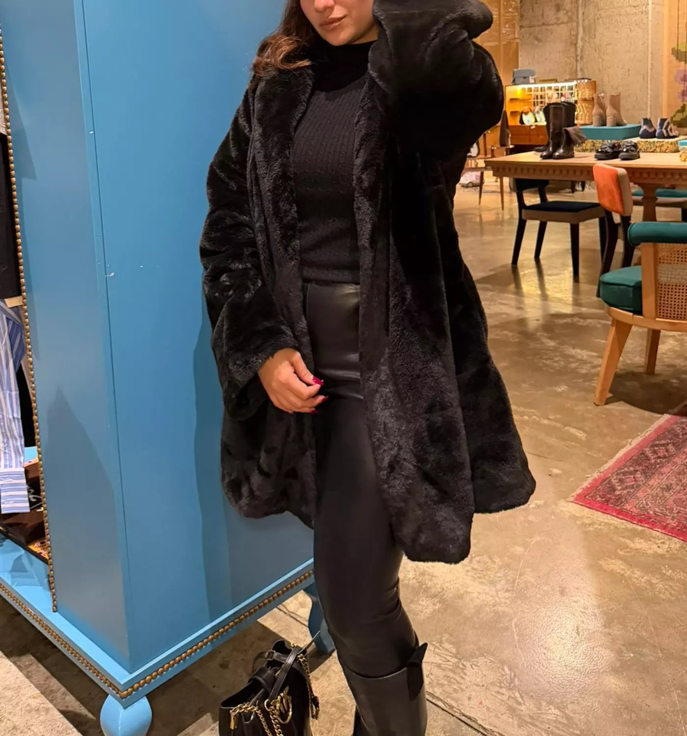 Black fur coat hover image